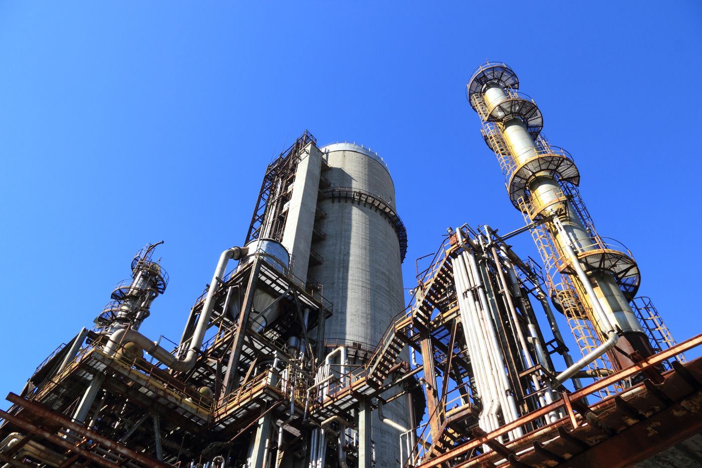 Illustrative industrial columns. Not the project boilers.